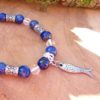 bracelet lapis lazuli et cristal de roche pour Femme avec breloque poisson