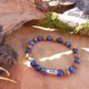 bracelet homme lapis lazuli bois fossile et lotus communication