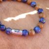 bracelet homme lapis lazuli bois fossile et lotus communication