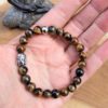 bracelet femme œil de fer bouddha protection énergie yang jaspe hématite