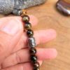 bracelet femme œil de fer bouddha protection énergie yang jaspe hématite