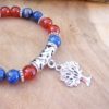 bracelet lapis lazuli et cornaline breloque arbre de vie pour femme courage confiance communication protection rouge bleu chakra sacré gorge