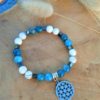 bracelet anti stress howlite apatite bleue hématite fleur de vie